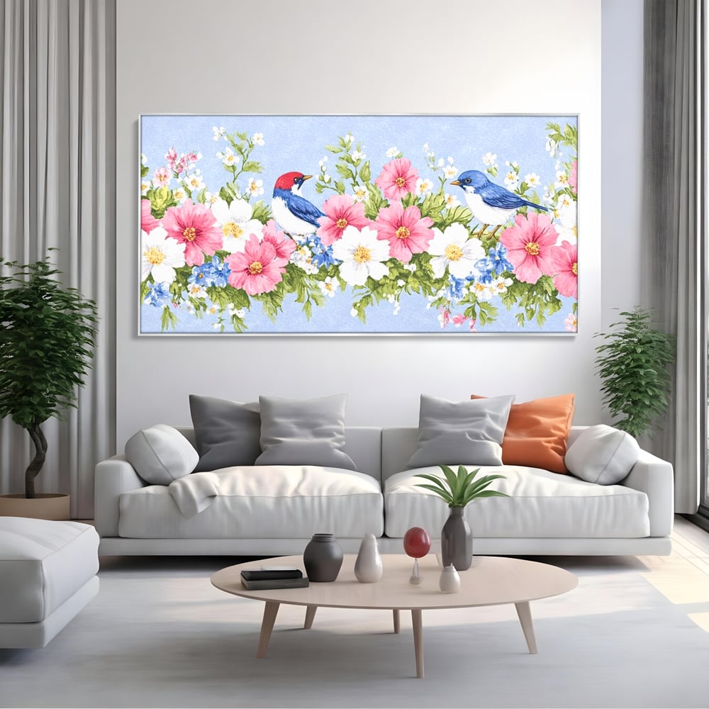 Tablou canvas cu tablou canvas cu pasari si flori pastel, in rama de aluminiu argintiu, pe perete intr-un living